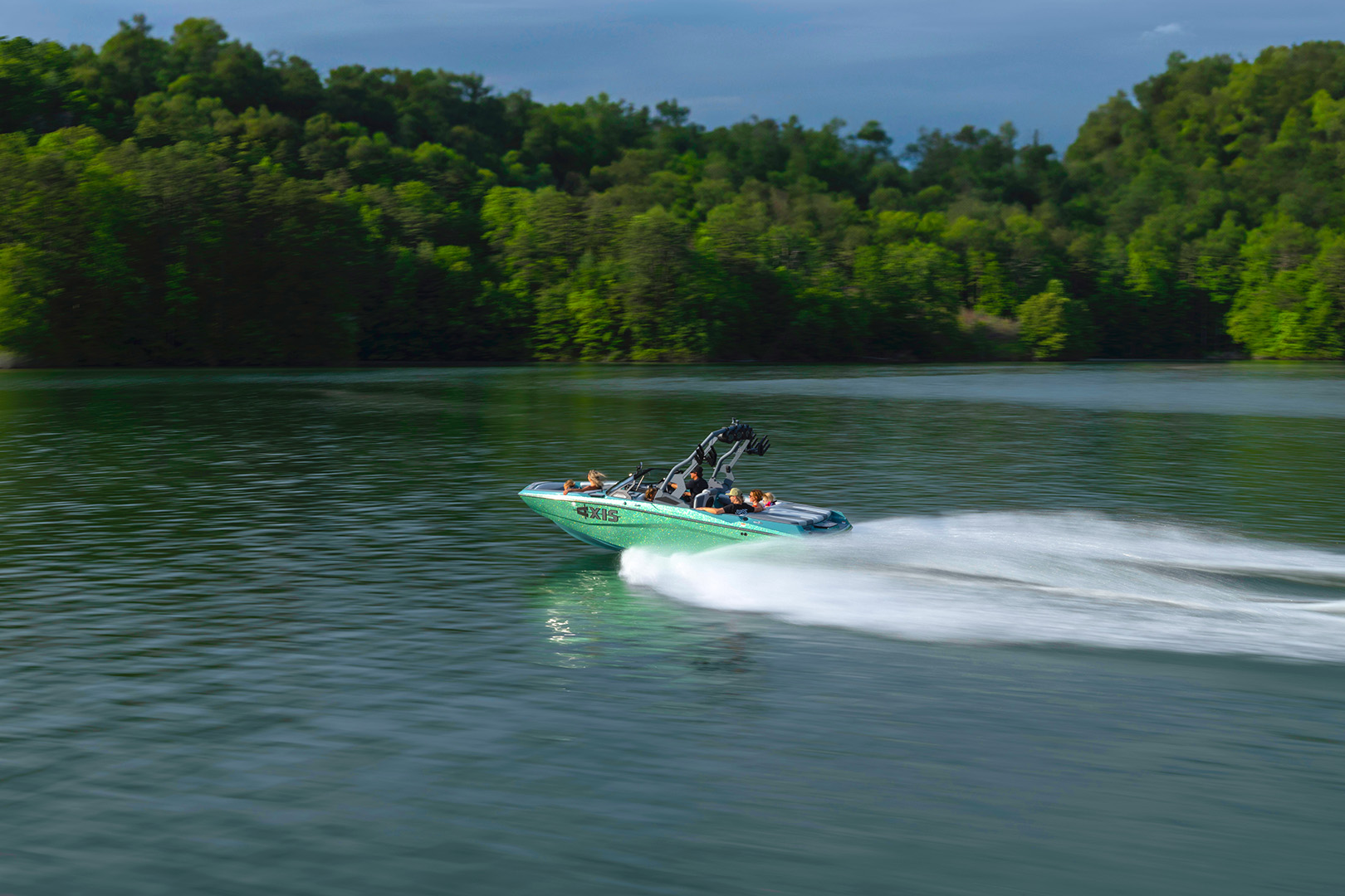 Side view of the Axis A200 carving across the lake at high speed.